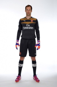 New Signing Petr Cech posing in Arsenal kit.